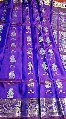 Rani pink and purple dual tone colour with golden colour zari Figure motif Swarnachari saree Rani pink and purple dual tone colour with golden colour zari Figure motif Swarnachari saree