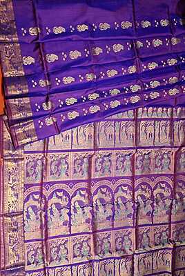 Rani pink and purple dual tone colour with golden colour zari Figure motif Swarnachari saree