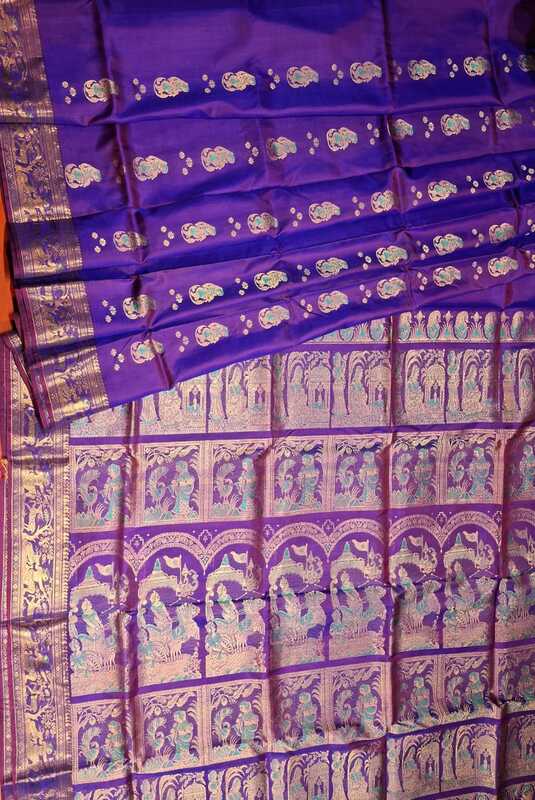 Rani pink and purple dual tone colour with golden colour zari Figure motif Swarnachari saree Rani pink and purple dual tone colour with golden colour zari Figure motif Swarnachari saree