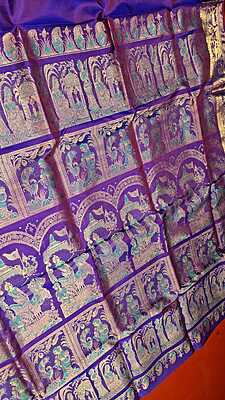 Rani pink and purple dual tone colour with golden colour zari Figure motif Swarnachari saree Rani pink and purple dual tone colour with golden colour zari Figure motif Swarnachari saree