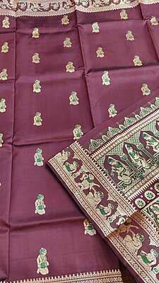 Dark onion pink color figure motif with light green meena on pure Mulberry silk Dark onion pink color figure motif with light green meena on pure Mulberry silk