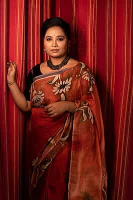 Rust Orange color pure Mulberry silk with flower hand batik motif saree from our Mystic Radainave collection Rust Orange color pure Mulberry silk with flower hand batik motif saree from our Mystic Radainave collection