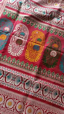 Revival Baluchari saree in pure Mulberry silk with multiple color buta in Cherry red red color Revival Baluchari saree in pure Mulberry silk with multiple color buta in Cherry red red color