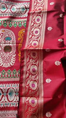 Revival Baluchari saree in pure Mulberry silk with multiple color buta in Cherry red red color Revival Baluchari saree in pure Mulberry silk with multiple color buta in Cherry red red color