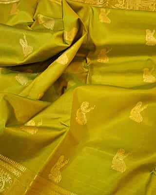 Golden green color Figurine motif pure Mulberry silk Baluchari saree Golden green color Figurine motif pure Mulberry silk Baluchari saree