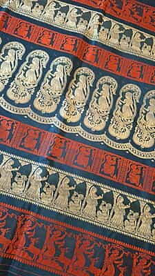 Black color pure Mulberry silk saree Baluchari saree with orange and beige ganga Jamuna border Black color pure Mulberry silk saree Baluchari saree with orange and beige ganga Jamuna border