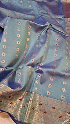 Powder blue 2000 buta swarnachari saree Powder blue 2000 buta swarnachari saree