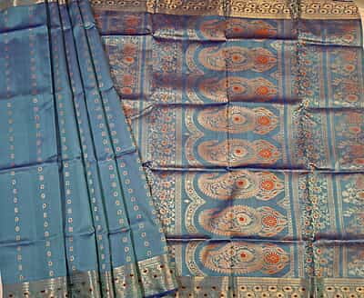 Powder blue 2000 buta swarnachari saree