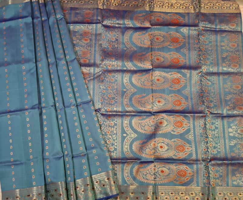 Powder blue 2000 buta swarnachari saree Powder blue 2000 buta swarnachari saree