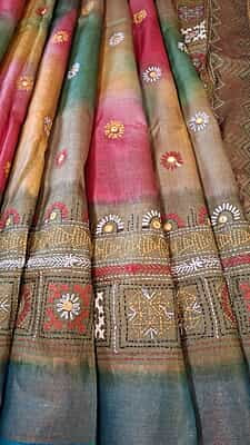 Tassar Lambani work saree in shades of Multiple color