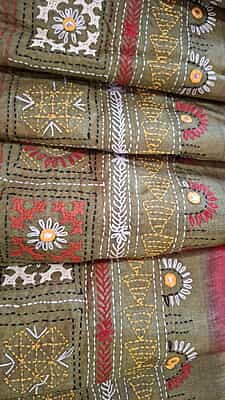 Tassar Lambani work saree in shades of Multiple color