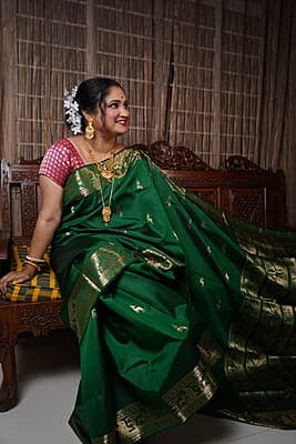 Heeran Green pure katan silk Swarnachari Heeran Green pure katan silk Swarnachari