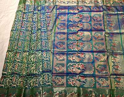 Color Blue green dual tone with golden colour zari All over work Swarnachari Saree