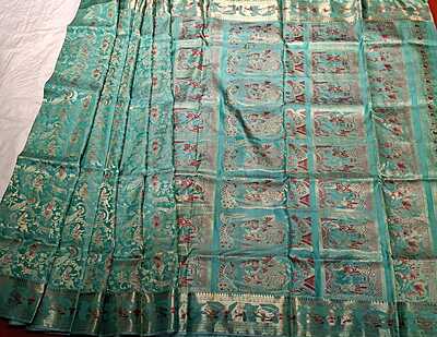 Color Light sea green with golden colour zari all over work Swarnachari saree