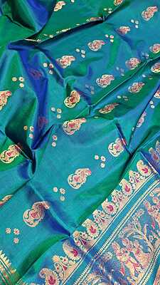 Color Blue green dual tone with golden colour zari  Figure motif Swarnachari