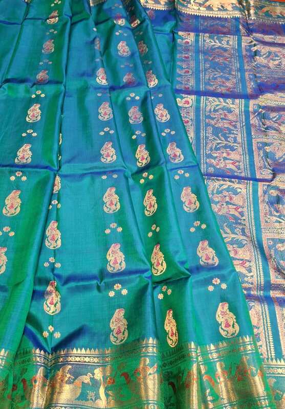 Color Blue green dual tone with golden colour zari  Figure motif Swarnachari