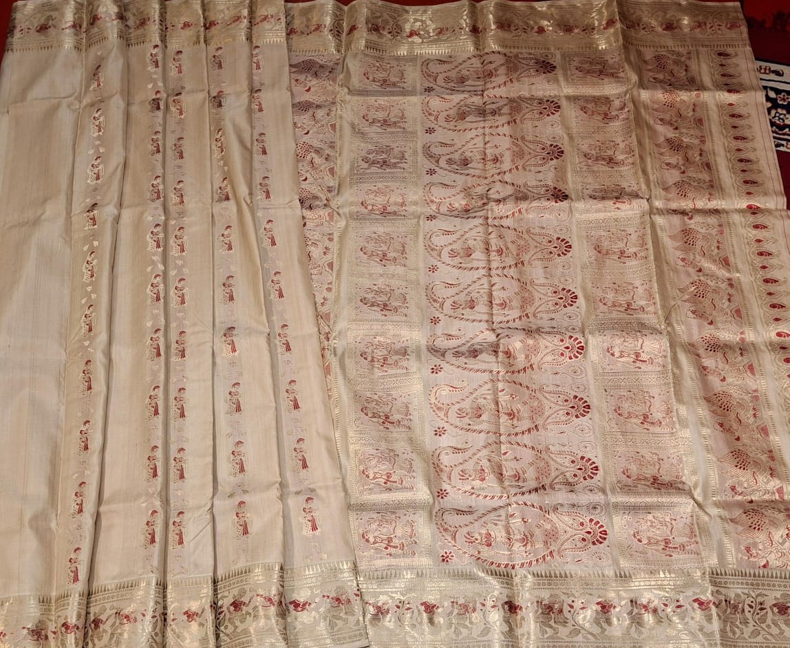 Figure motif Swarnachari in pure tassar with golden zari and red meena