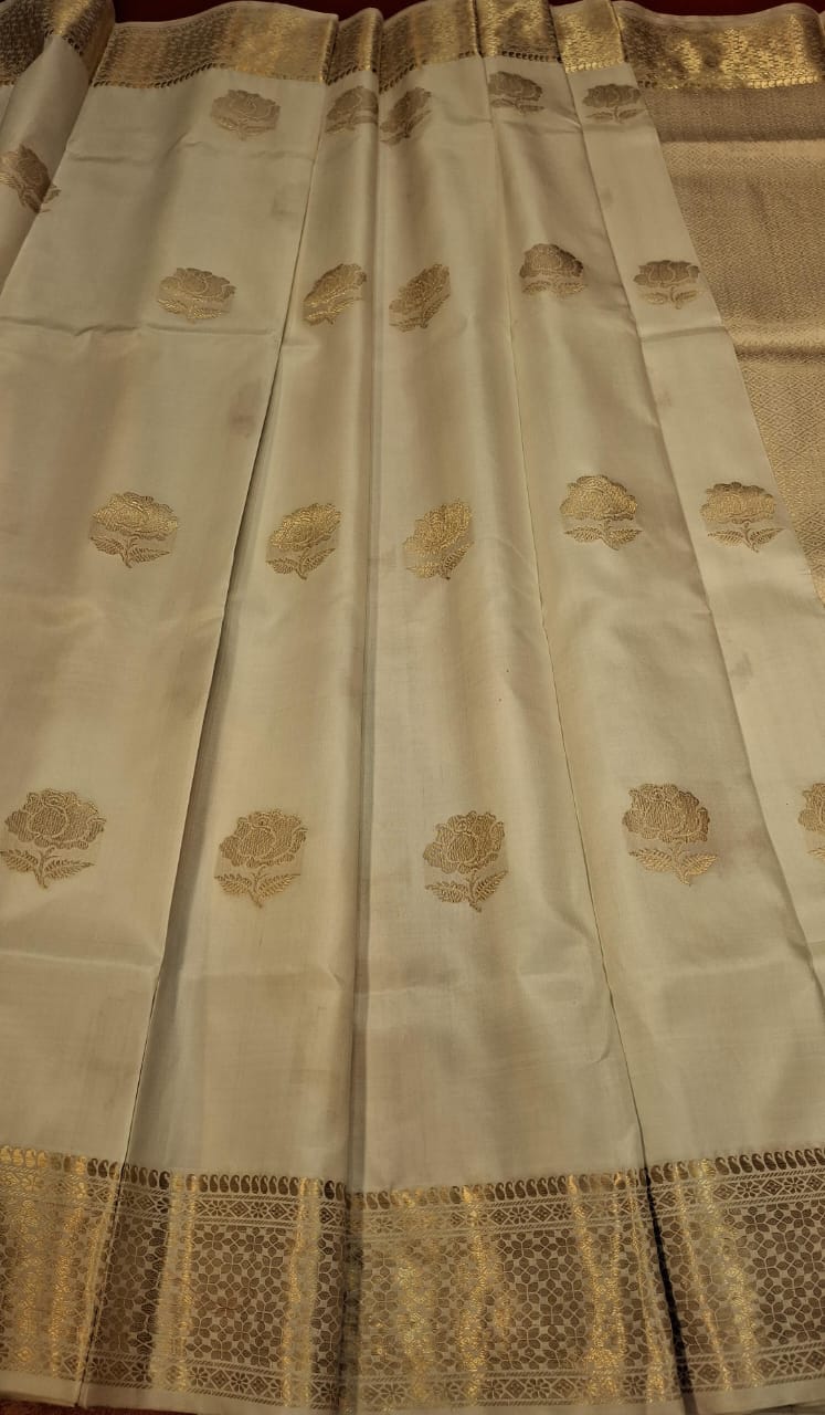 Rose Swarnachari white color saree with golden zari in pure tassar Rose Swarnachari white color saree with golden zari in pure tassar