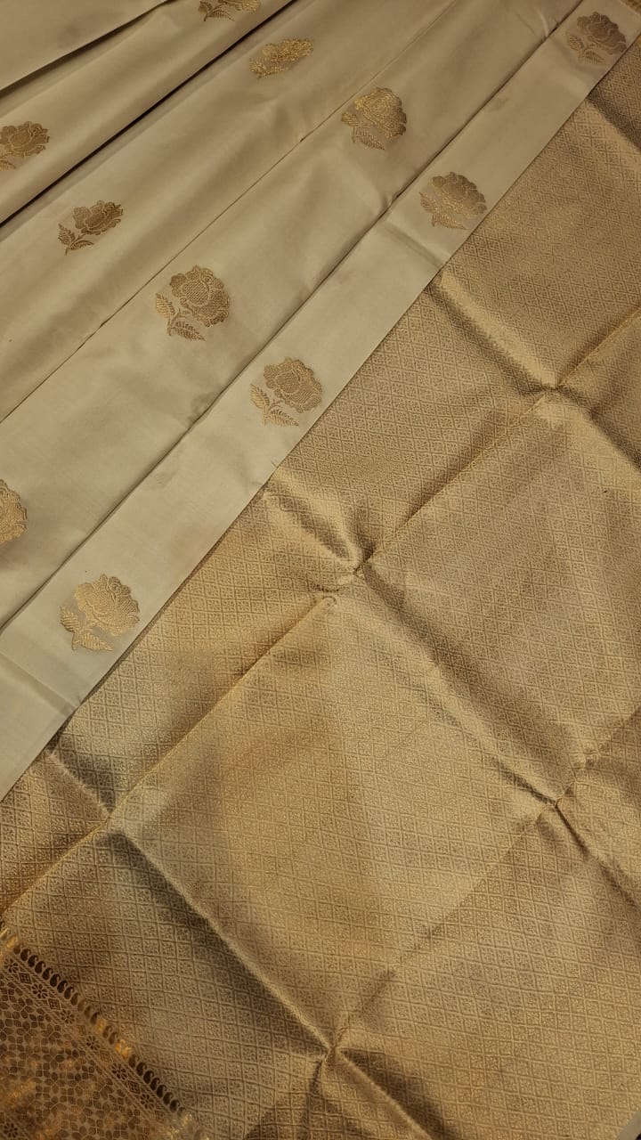 Rose Swarnachari white color saree with golden zari in pure tassar Rose Swarnachari white color saree with golden zari in pure tassar