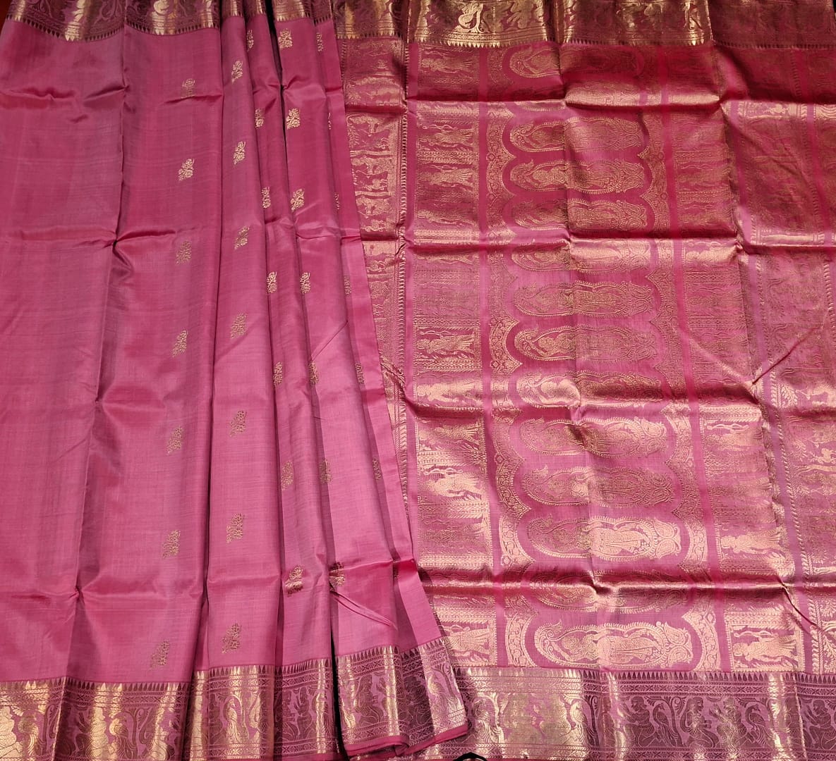 Flower Motif Swarnachari pink color resham saree with golden zari