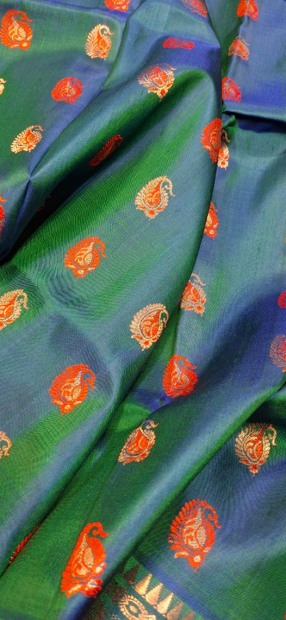 Figure motif Swarnachari Blue green dual tone with golden colour zari Figure motif Swarnachari Blue green dual tone with golden colour zari