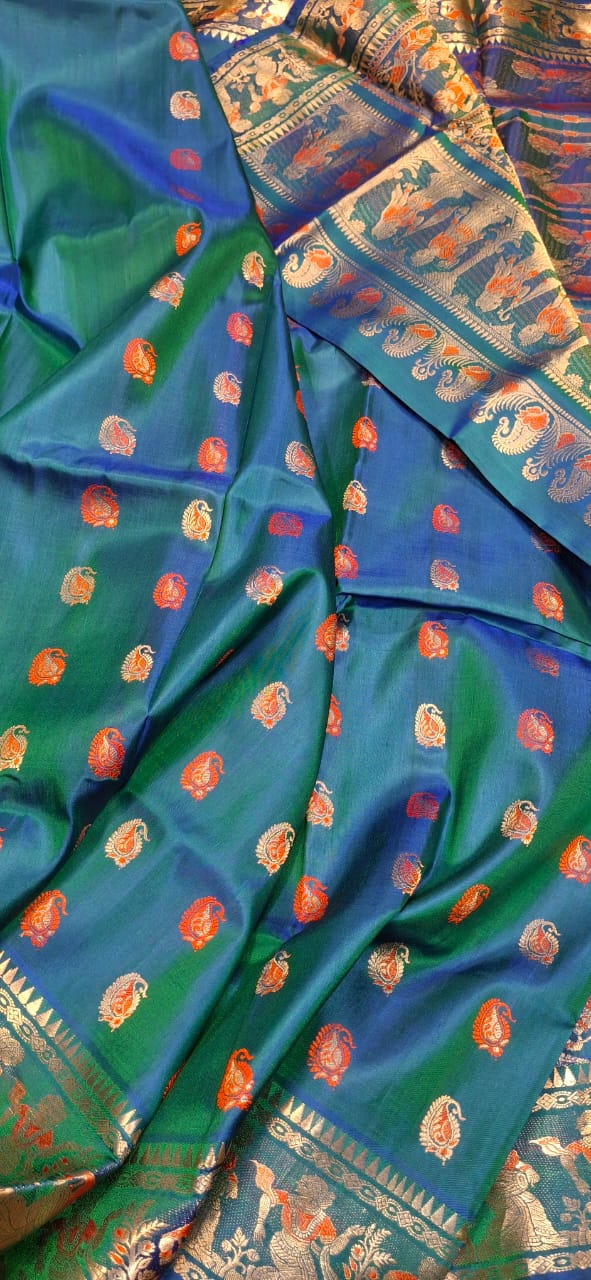 Figure motif Swarnachari Blue green dual tone with golden colour zari Figure motif Swarnachari Blue green dual tone with golden colour zari