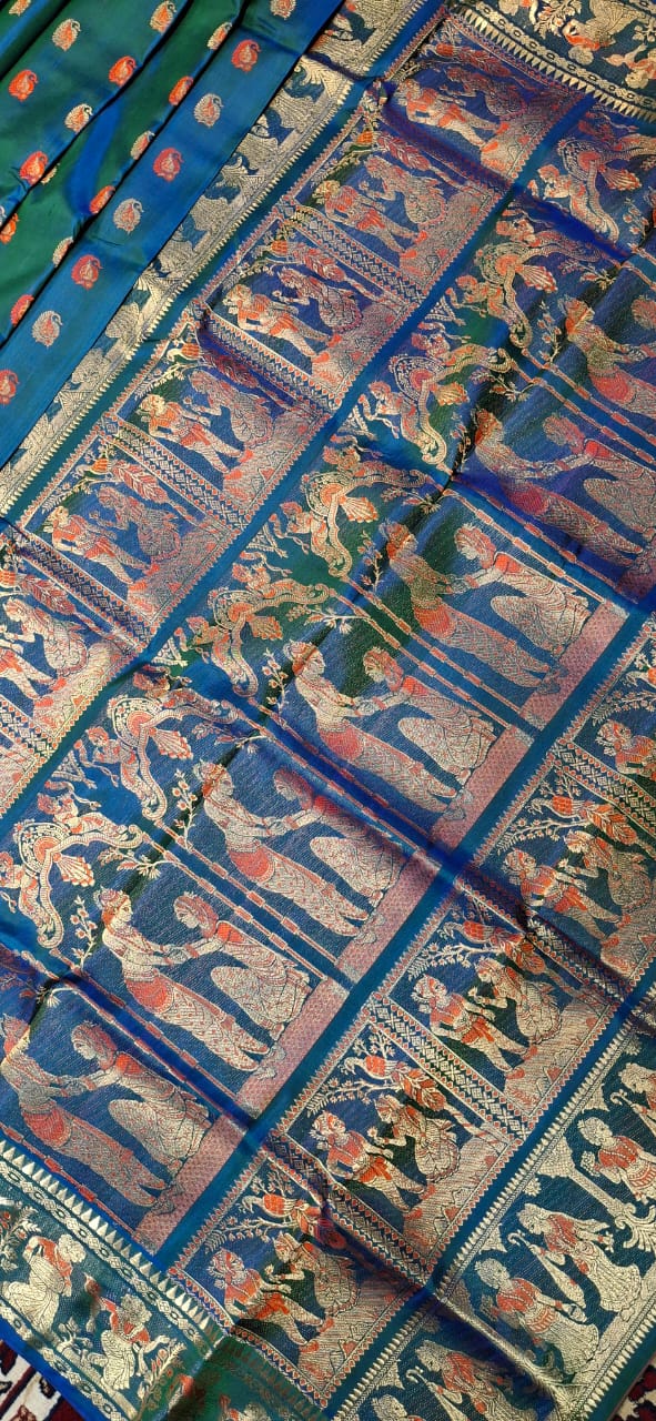 Figure motif Swarnachari Blue green dual tone with golden colour zari Figure motif Swarnachari Blue green dual tone with golden colour zari