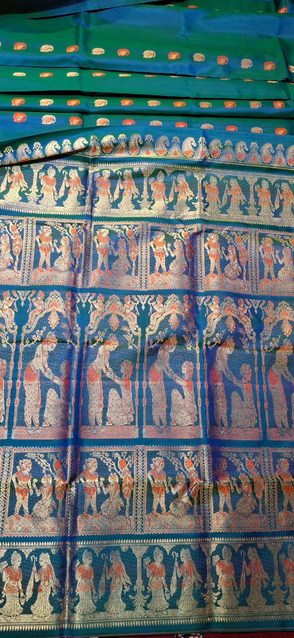 Figure motif Swarnachari Blue green dual tone with golden colour zari Figure motif Swarnachari Blue green dual tone with golden colour zari