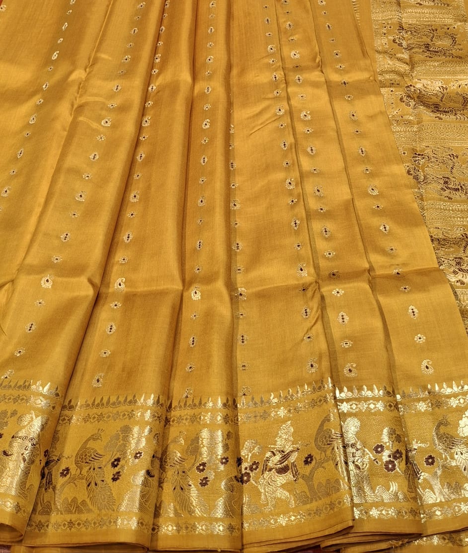 Figure motif 2000 buta Swarnachari colour golden yellow Figure motif 2000 buta Swarnachari colour golden yellow