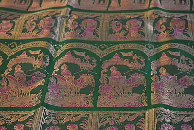 Green figure motif pure katan silk Swarnachari saree