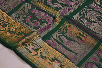 Green figure motif pure katan silk Swarnachari saree