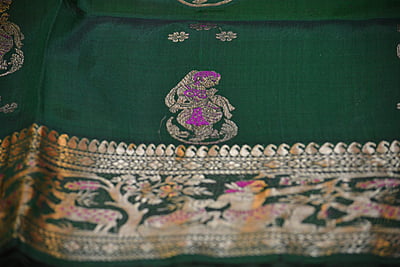 Green figure motif pure katan silk Swarnachari saree